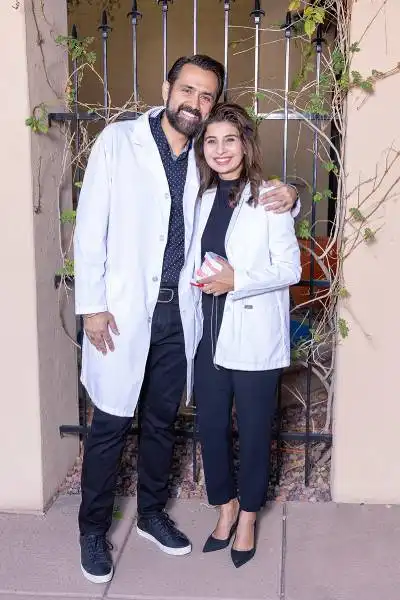 Dr. Sandhu and Dr. Bajwa outside their Phoenix dental office